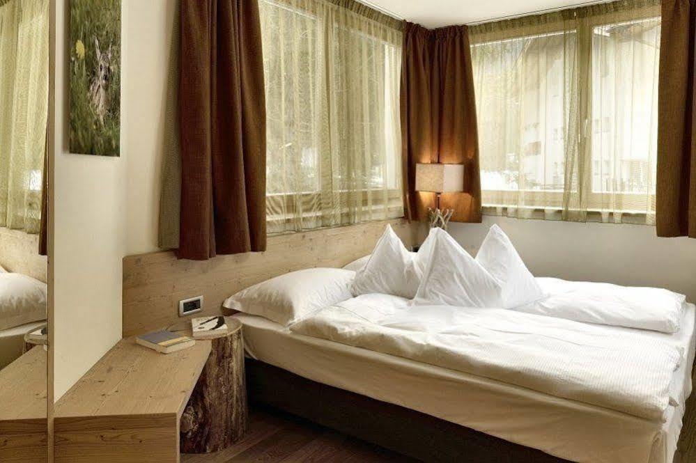 Color Home Suite Apartments Predazzo Bagian luar foto