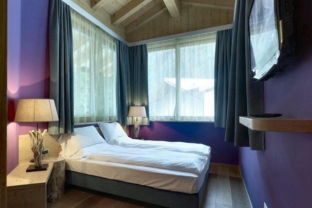 Color Home Suite Apartments Predazzo Bagian luar foto